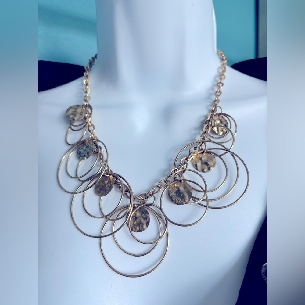 Yellow golden fashion necklace with hoops and discs